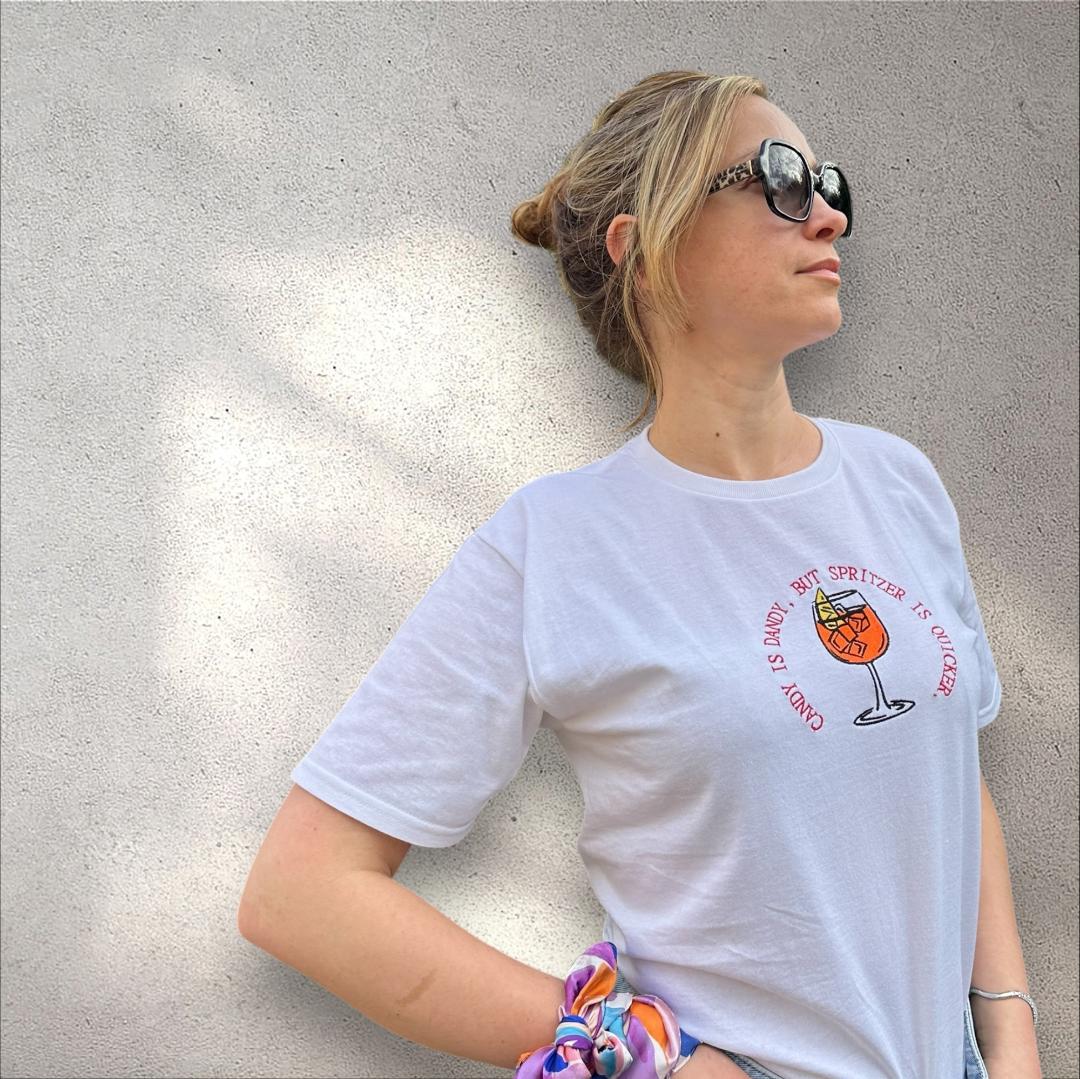 Best Summer Tee T-shirt for Aperol Spritz Fans - Embroidered quote ''Candy is Dandy, But Spritzer is Quicker'' unique rare make a statement