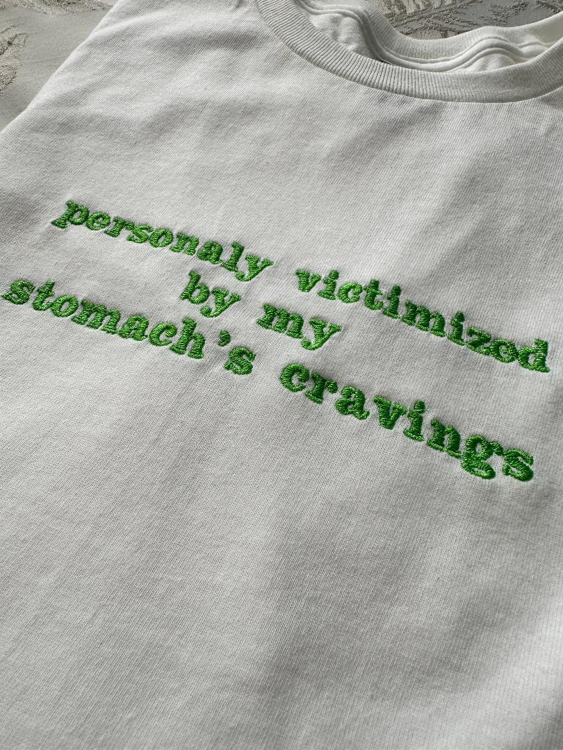 Beautifully Embroidered Women's T-Shirt with Funny Quote 'Personaly Victimized by My Stomach's Cravings' gift for friend, funny Tummy hurts
