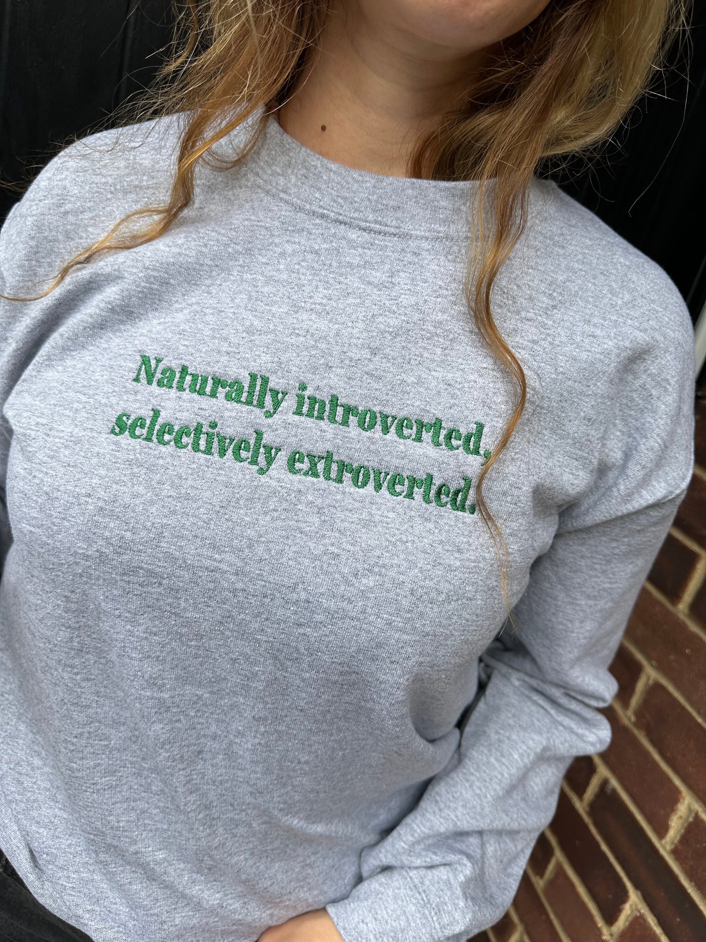 Unisex Embroidered ''Naturally introverted, selectively extroverted'' crewneck sweatshirt