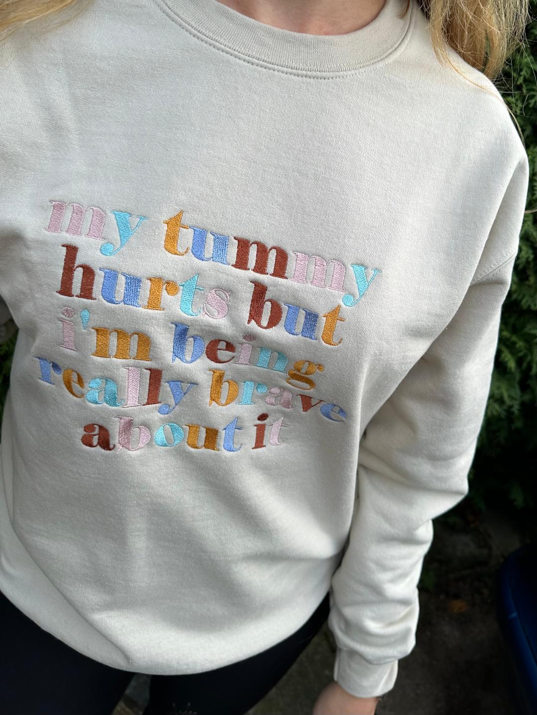 Custom Design Embroidered crewneck sweatshirt with quote ''My tummy hurts but I'm being really brave about it''