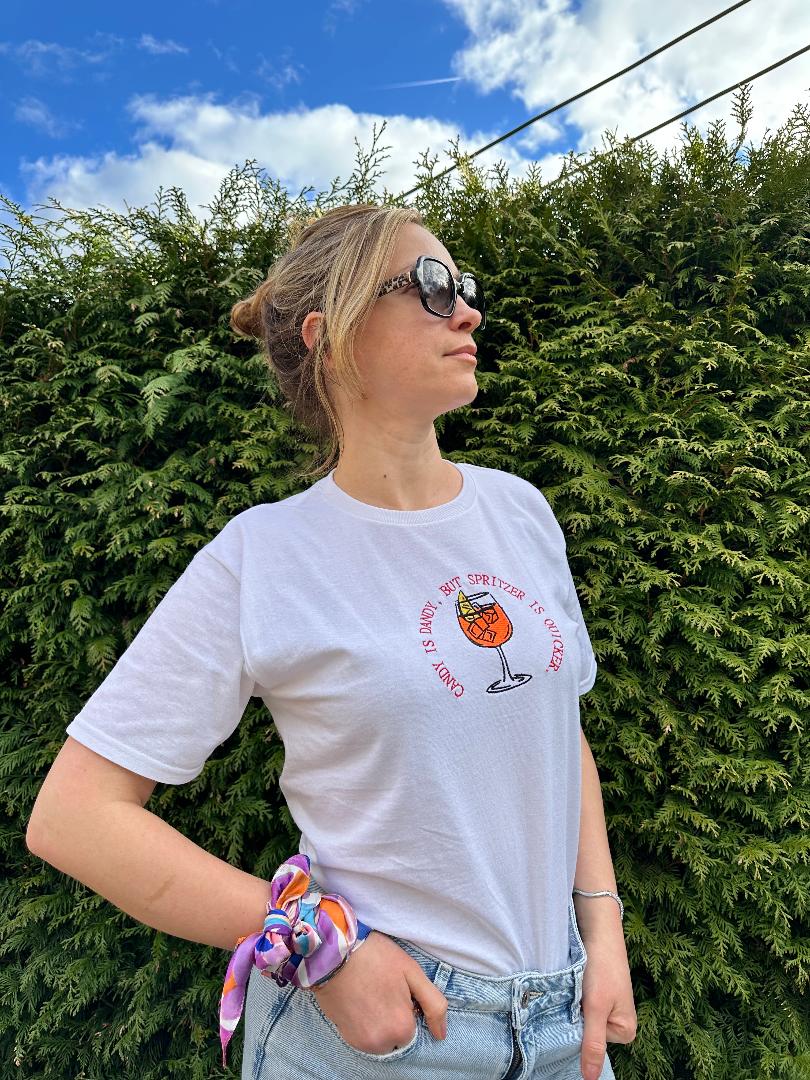 Best Summer Tee T-shirt for Aperol Spritz Fans - Embroidered quote ''Candy is Dandy, But Spritzer is Quicker'' unique rare make a statement