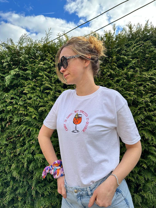 Best Summer Tee T-shirt for Aperol Spritz Fans - Embroidered quote ''Candy is Dandy, But Spritzer is Quicker'' unique rare make a statement