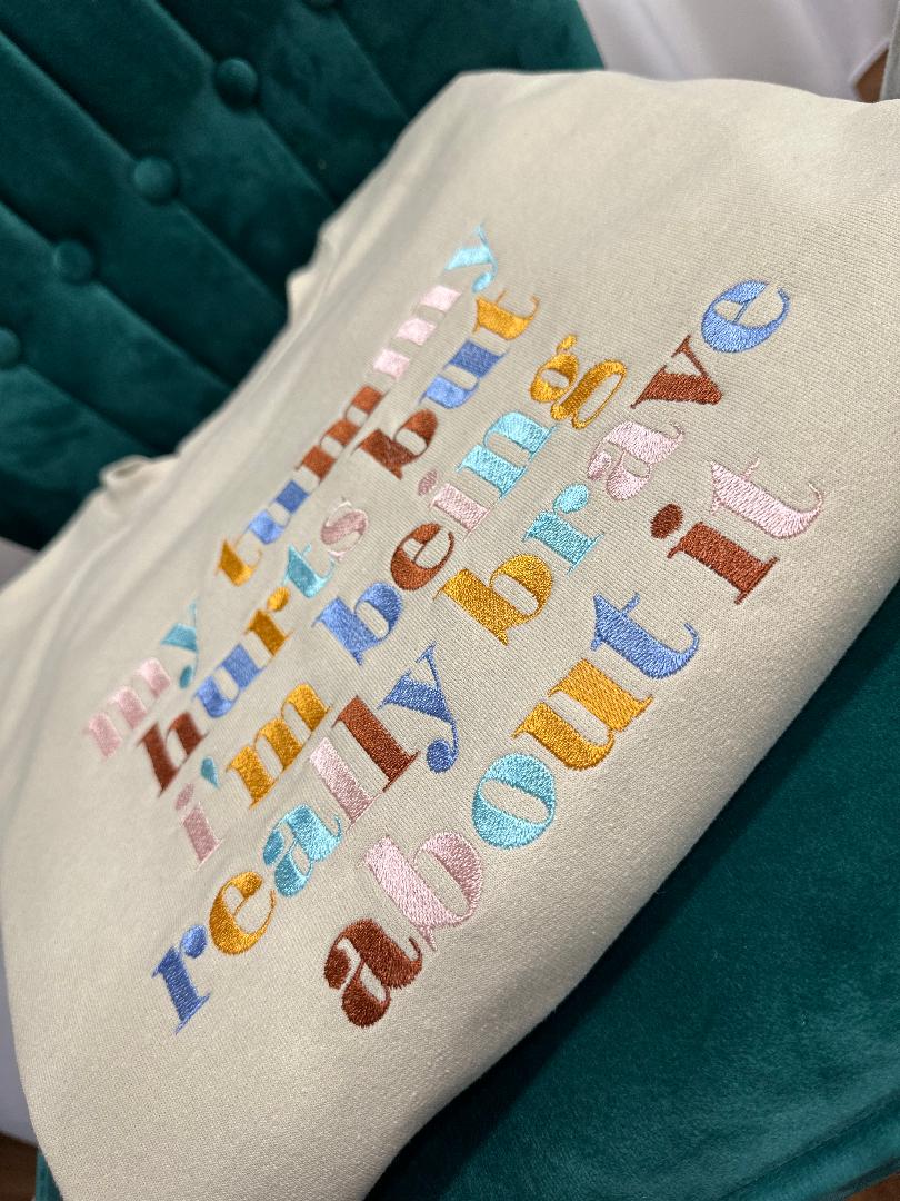 Custom Design Embroidered crewneck sweatshirt with quote ''My tummy hurts but I'm being really brave about it''