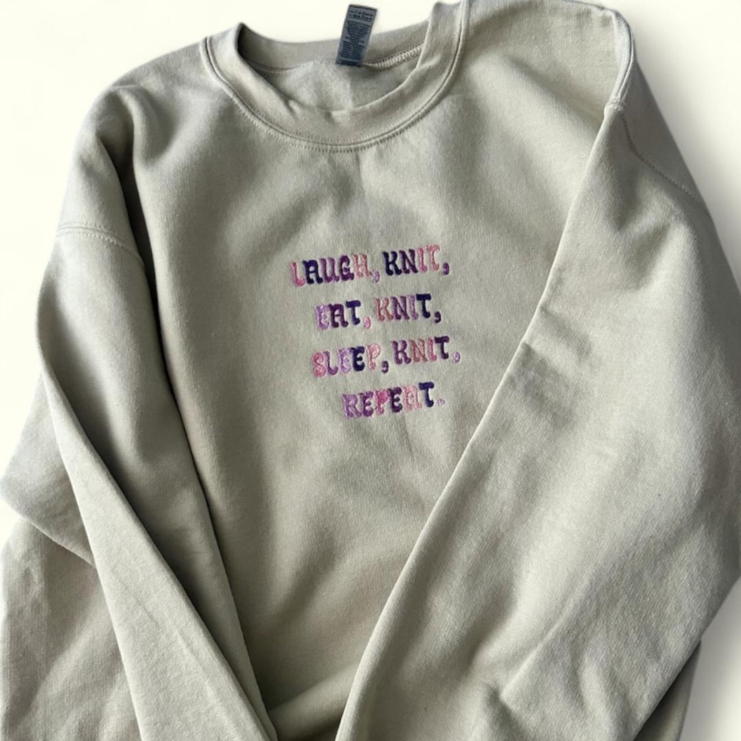 Embroidered crewneck sweatshirt ''Laugh, Knit, Eat, Knit, Sleep, Knit, Repeat''